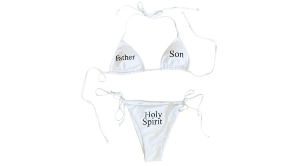 White string bikini signifying the Holy Trinity.