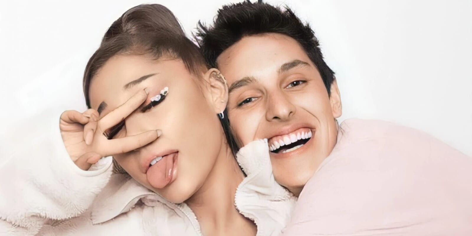Ariana Grande sticking out her tongue at the camera with husband Dalton Gomez.