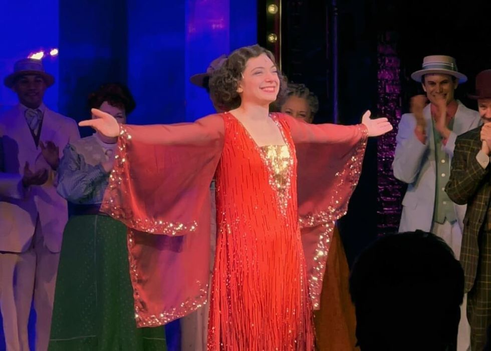 Julie Benko takes a curtain call in Funny Girl