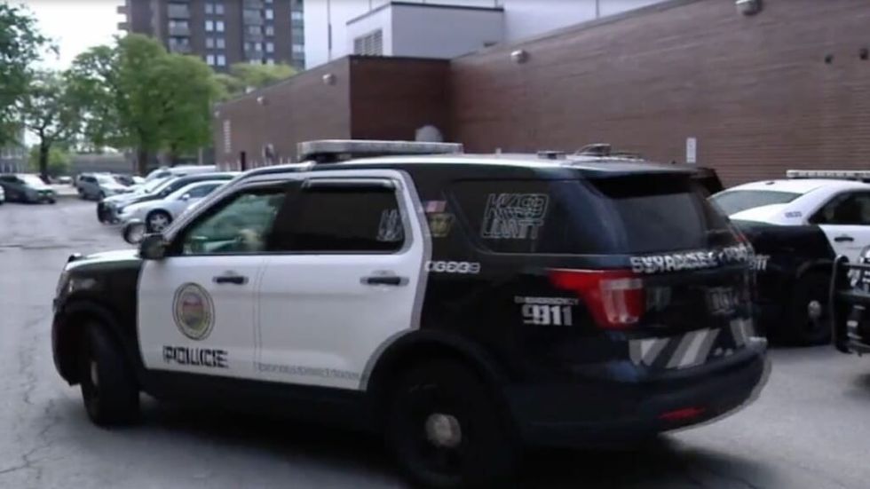 Syracuse police car springs into action