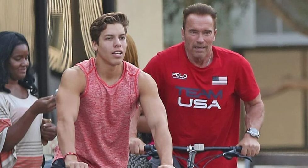 Joseph Baena and dad Arnold Schwarzenegger on a bike ride. 