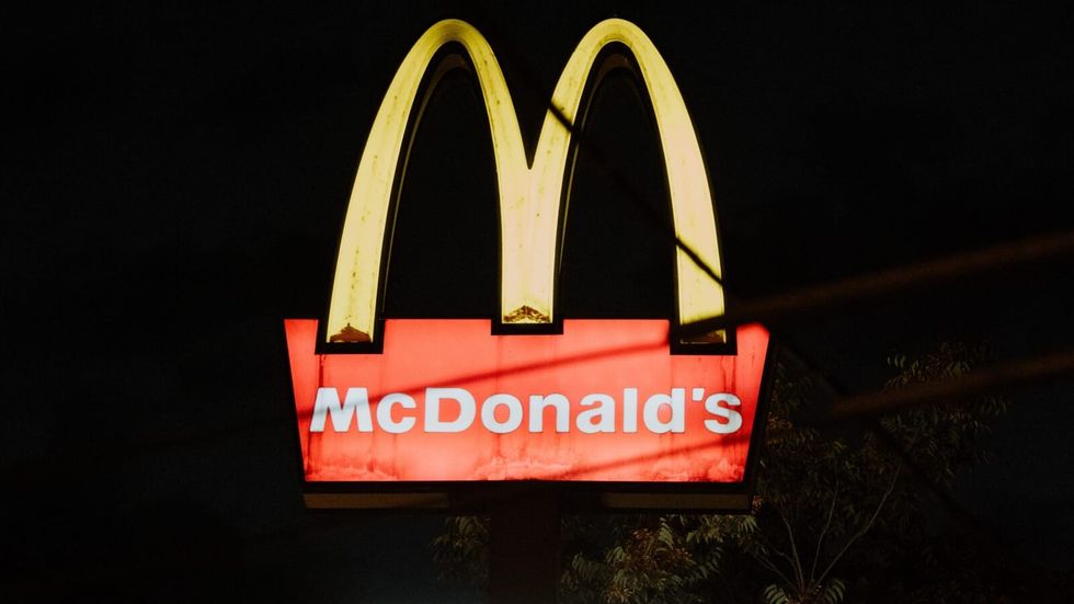 McDonald's sign lit up in the night
