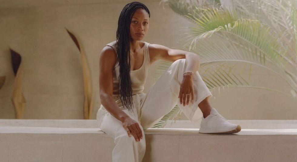 Allyson Felix dressed in all white for add with sneaker brand Saysh.