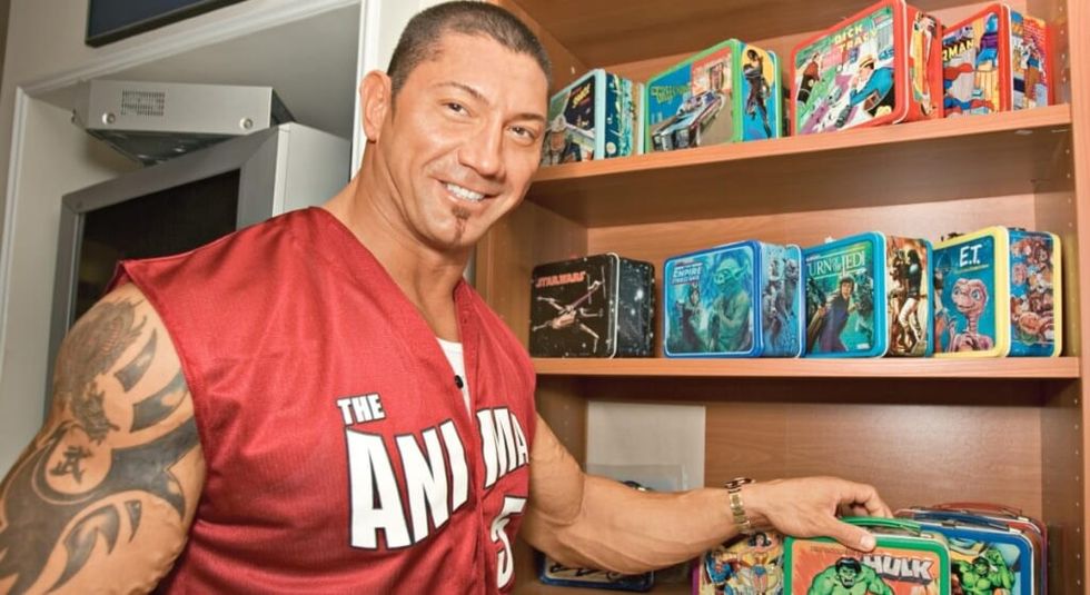 Dave Bautista with his collection of lunchboxes.