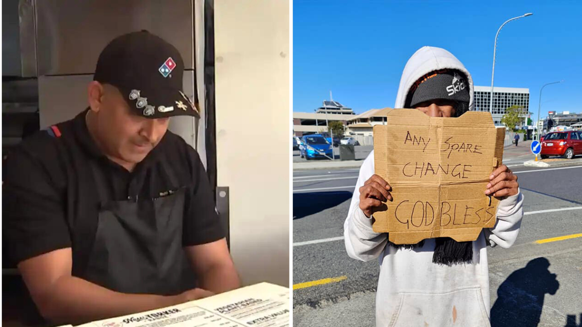 man wearing black cap and a homeless man holding a cardboard sign