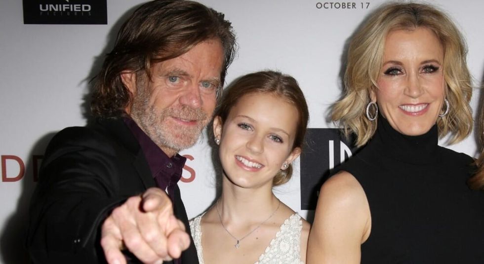 Felicity Huffman William H Macy posing and smiling with daughter..