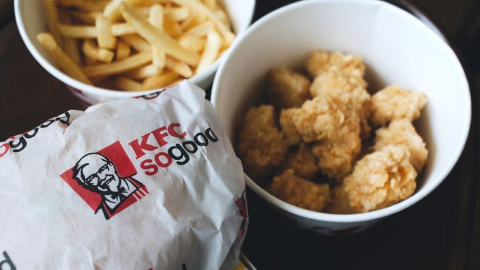 KFC meal with chicken sandwich, nuggets and fries