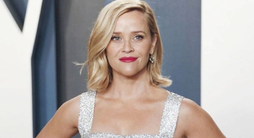 Reese Witherspoon in white dress at the Oscars.