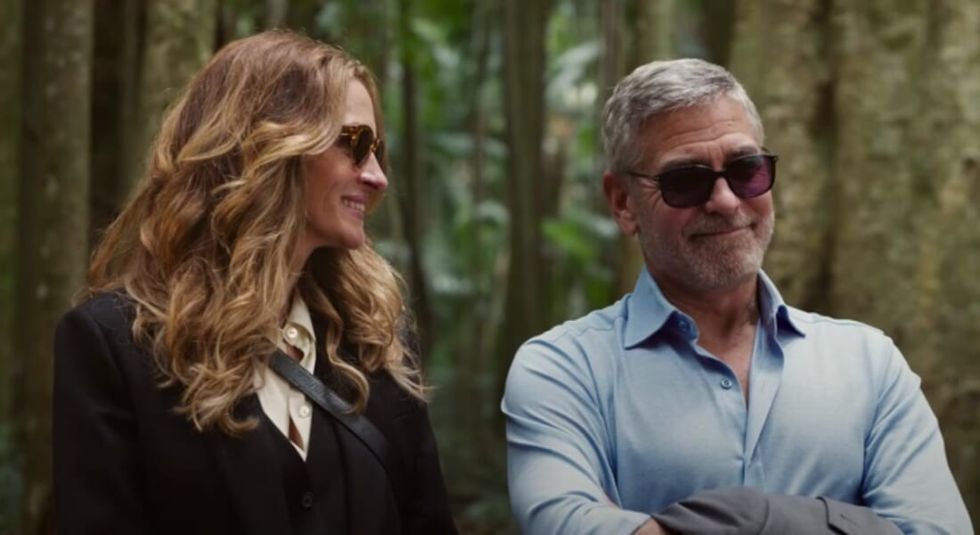 Julia Roberts looking at George Clooney in their latest movie, "Ticket to Paradise"