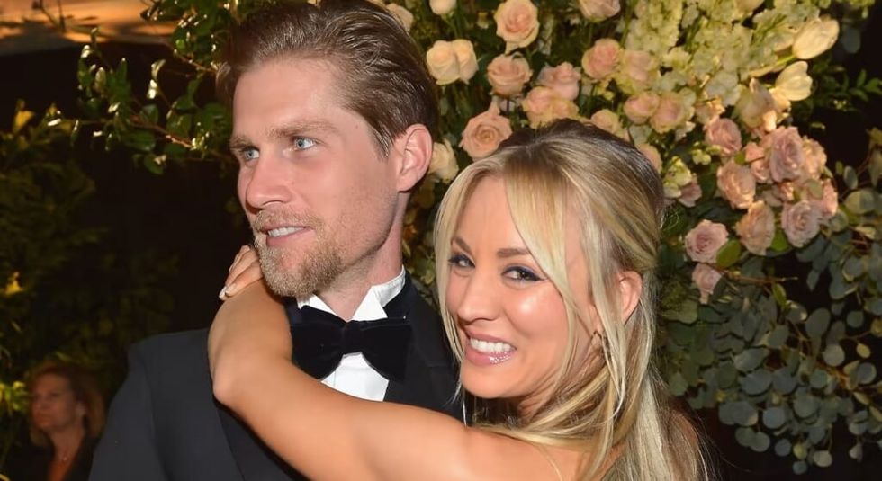 Kaley Cuoco with arms around ex husband Karl Cook.