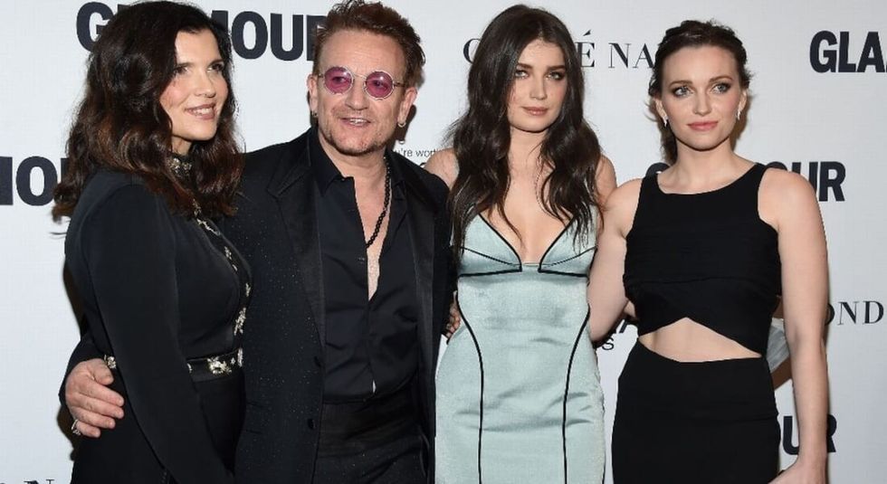 Bono and Ali Hewson with their two daughters on the red carpet.