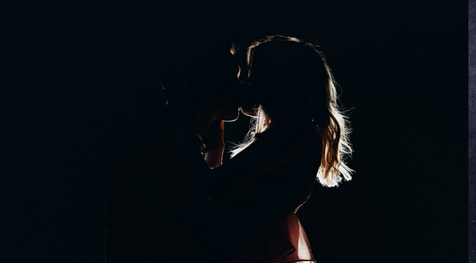 passionate couple in dark