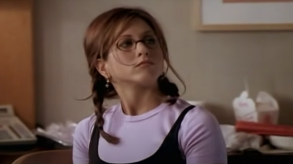 girl in pigtails and glasses