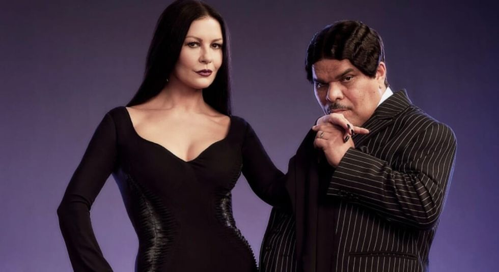 Catherine Zeta-Jones and Luis Guzmán as Morticia and Gomaz in Wednesday (2022)
