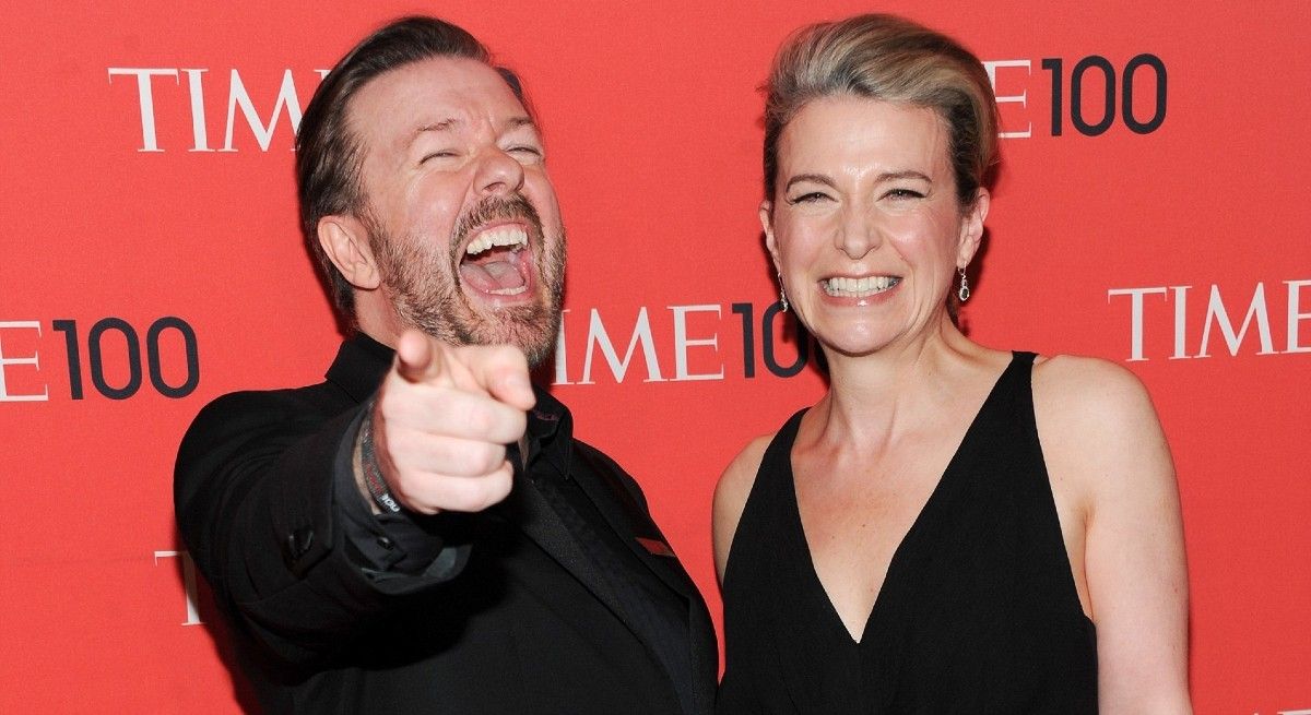 Ricky Gervais and their wife at the Time magazine awards.