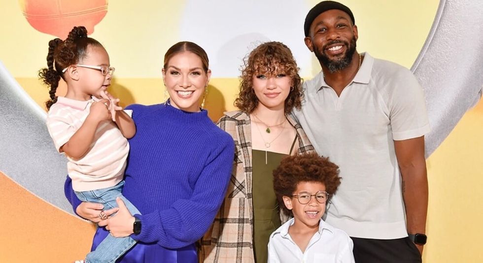 Stephen tWitch Boss posing with wife and children.