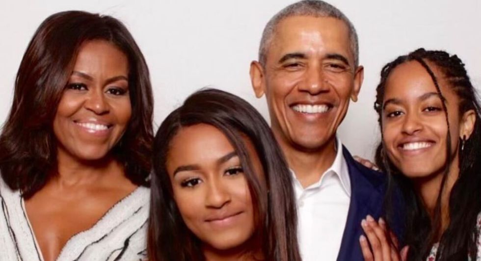 Michelle and Barack Obama with daughters Malia and Sasha. 