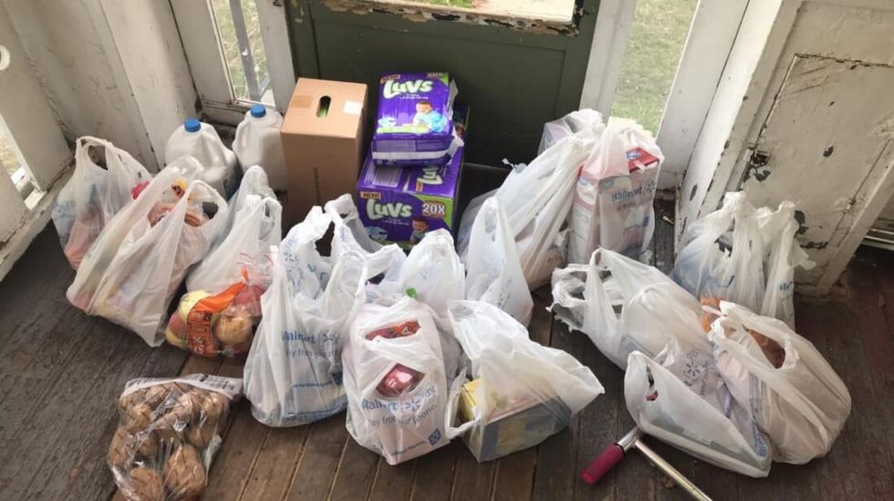 bags of groceries on front porch