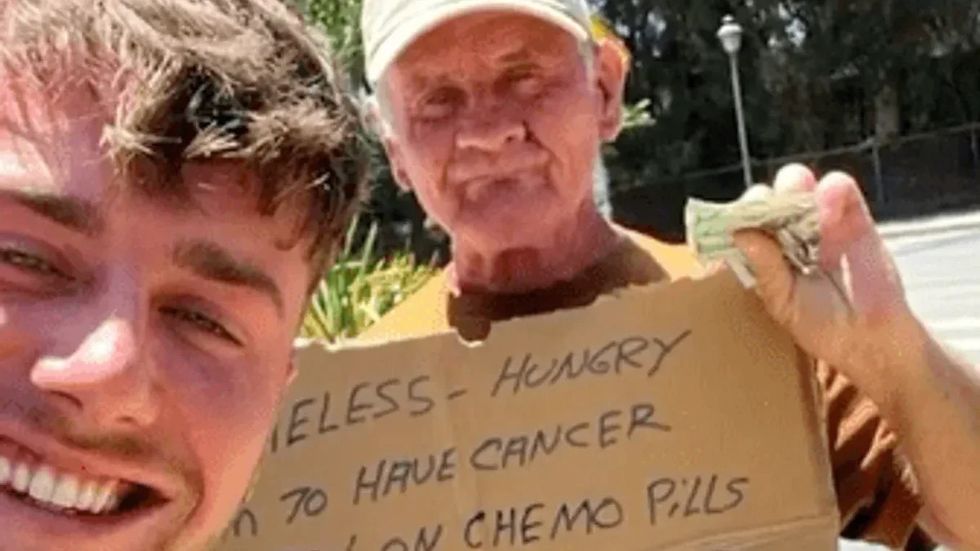 man taking a selfie with an elderly man