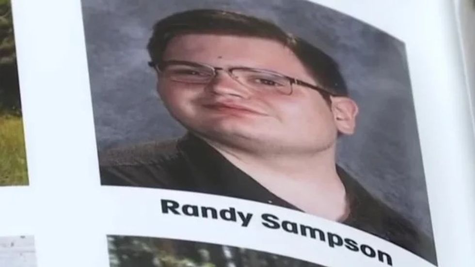 picture of high school student wearing glasses in a yearbook