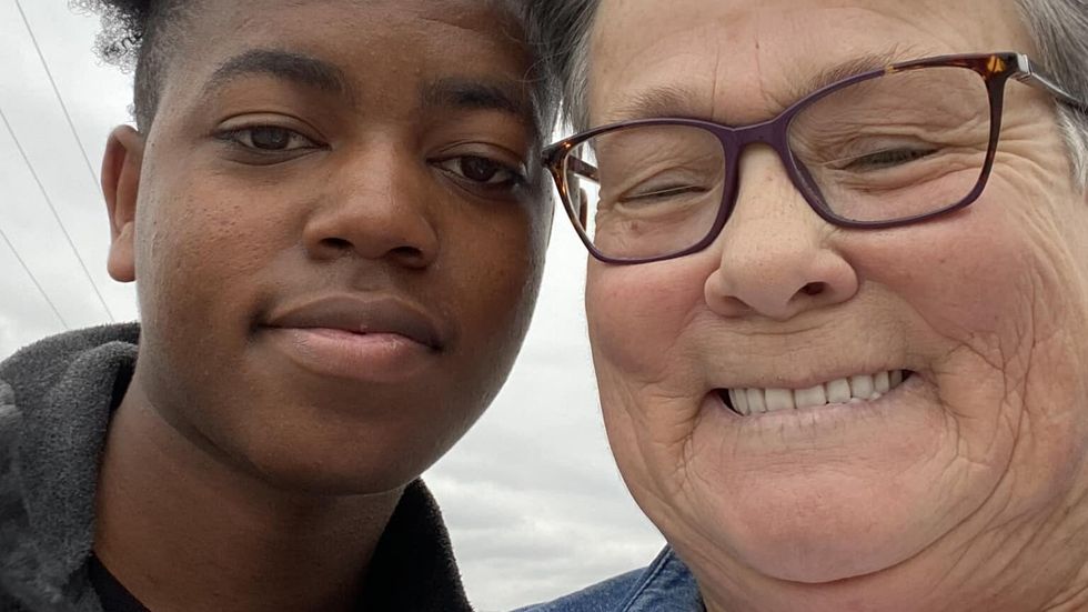 teen taking a selfie with an older woman