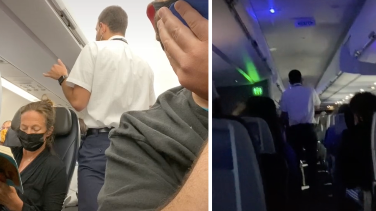 flight attendant speaking with a passenger