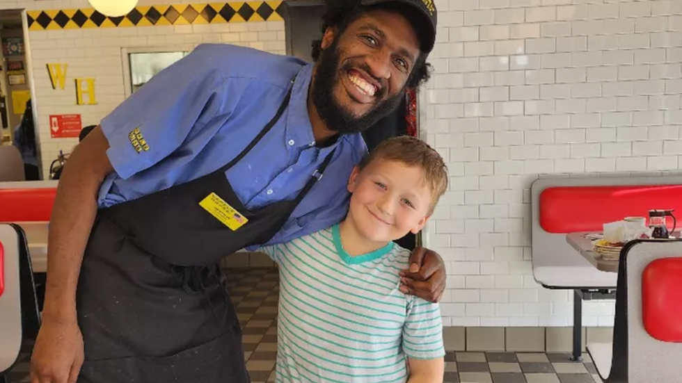 waffle house waiter and young customer