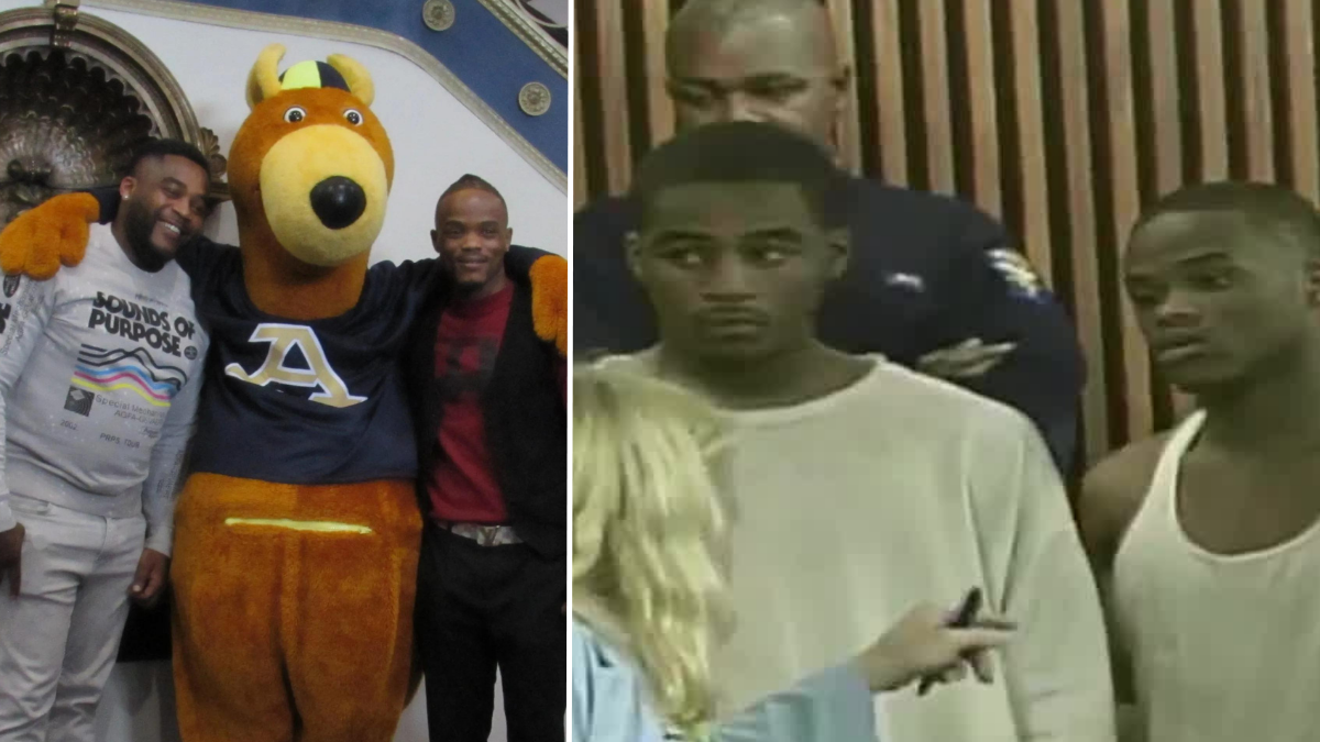two men with a university mascot and two teens in a court