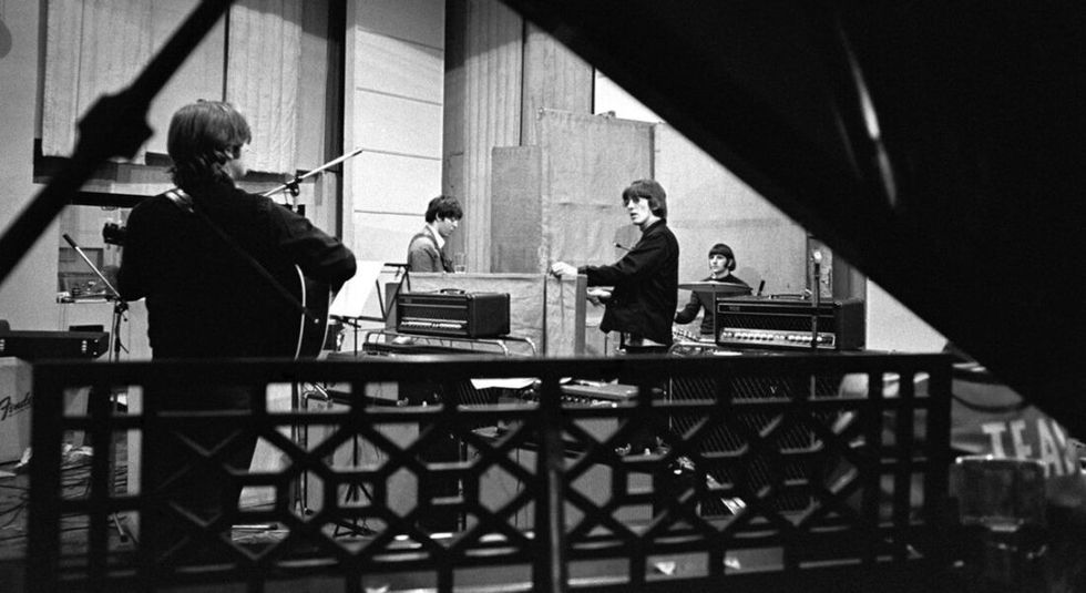 The Beatles black and white photo while recording Revolver.