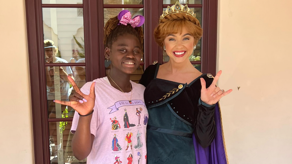 young girl and a woman dressed as Princess Anna