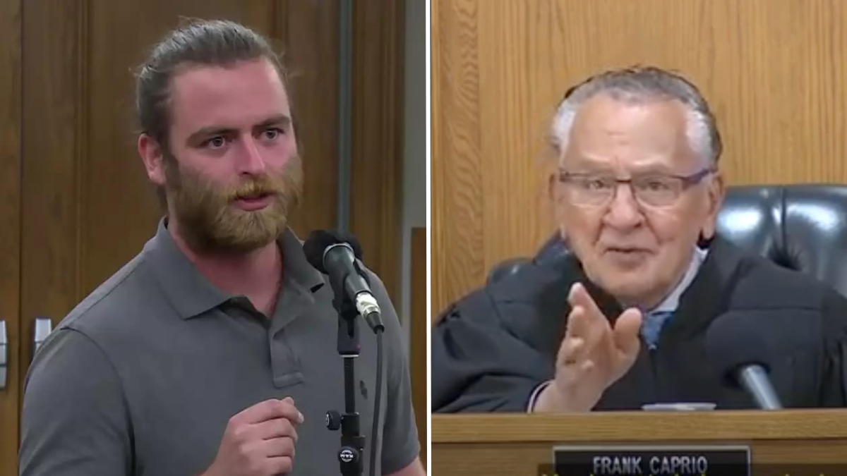 man with a beard talking into a mic and an elderly judge
