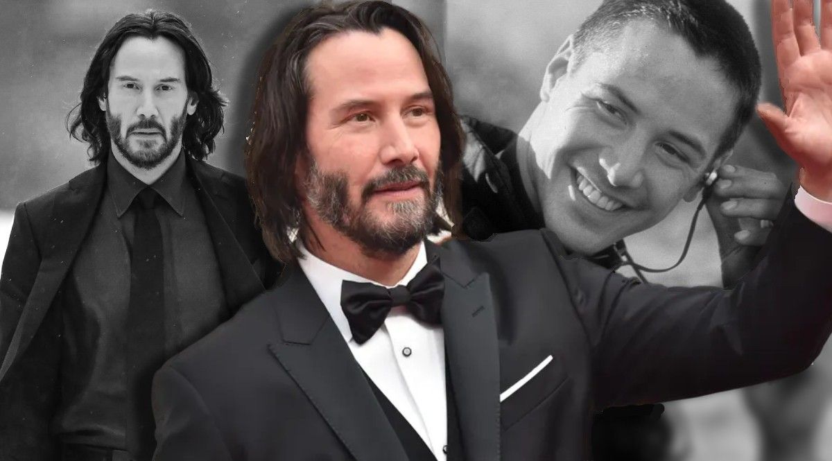 Keanu Reeves waiving to the crowd wearing a tuxedo.