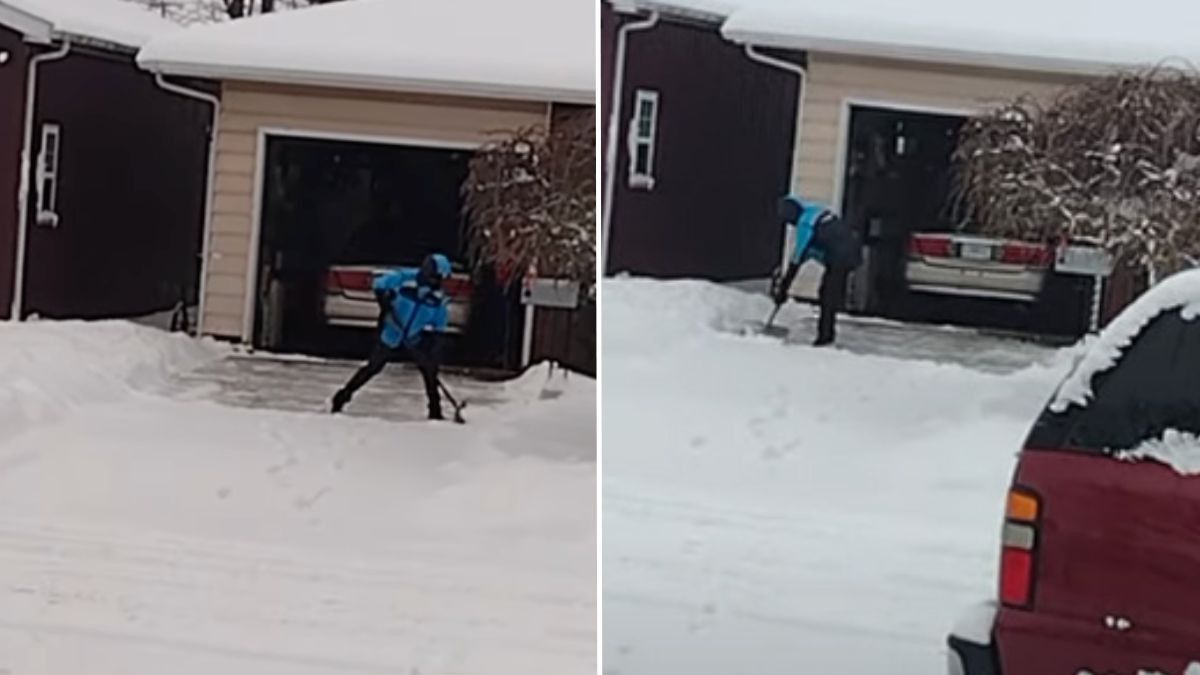 man shoveling a driveway