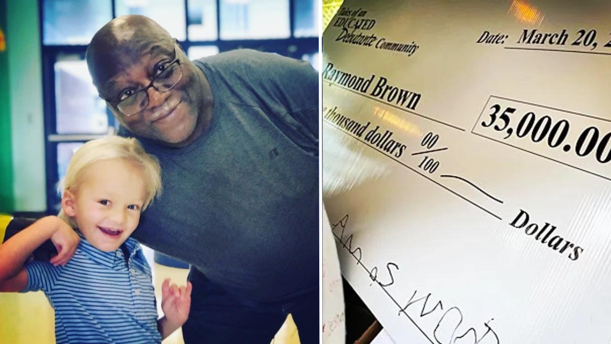 little boy with an older man and a cheque for $35,000