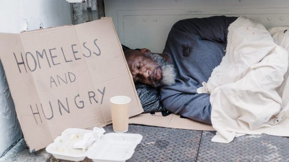 homeless man asleep