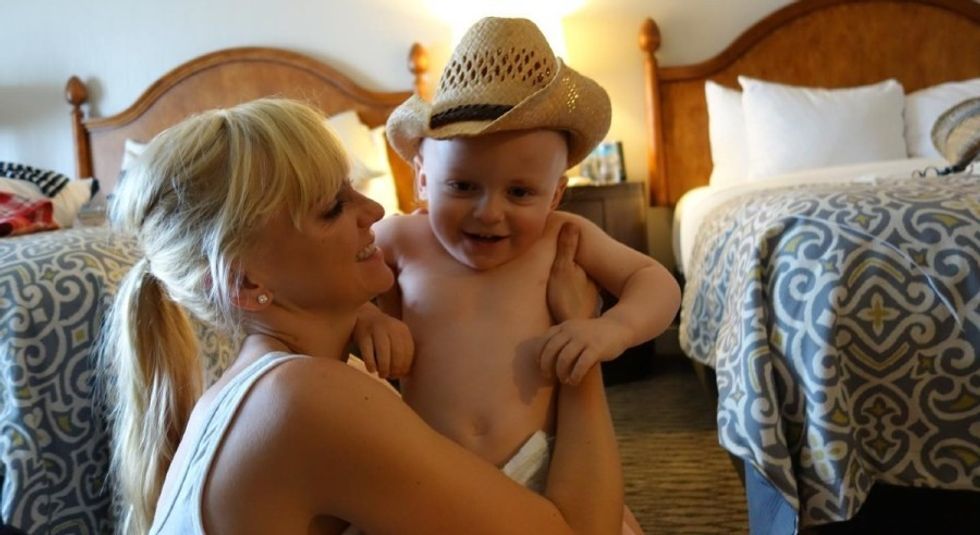 Anna Faris holding her and Chris Pratt's son when he was a baby.
