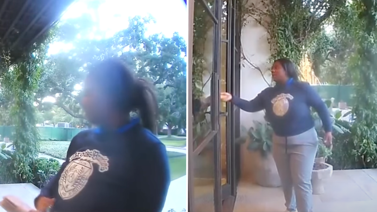 a person wearing a blue sweatshirt, ringing the doorbell