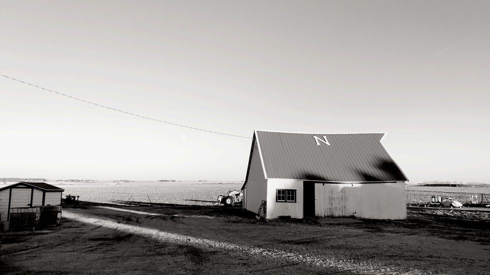 black and white photo of a single house