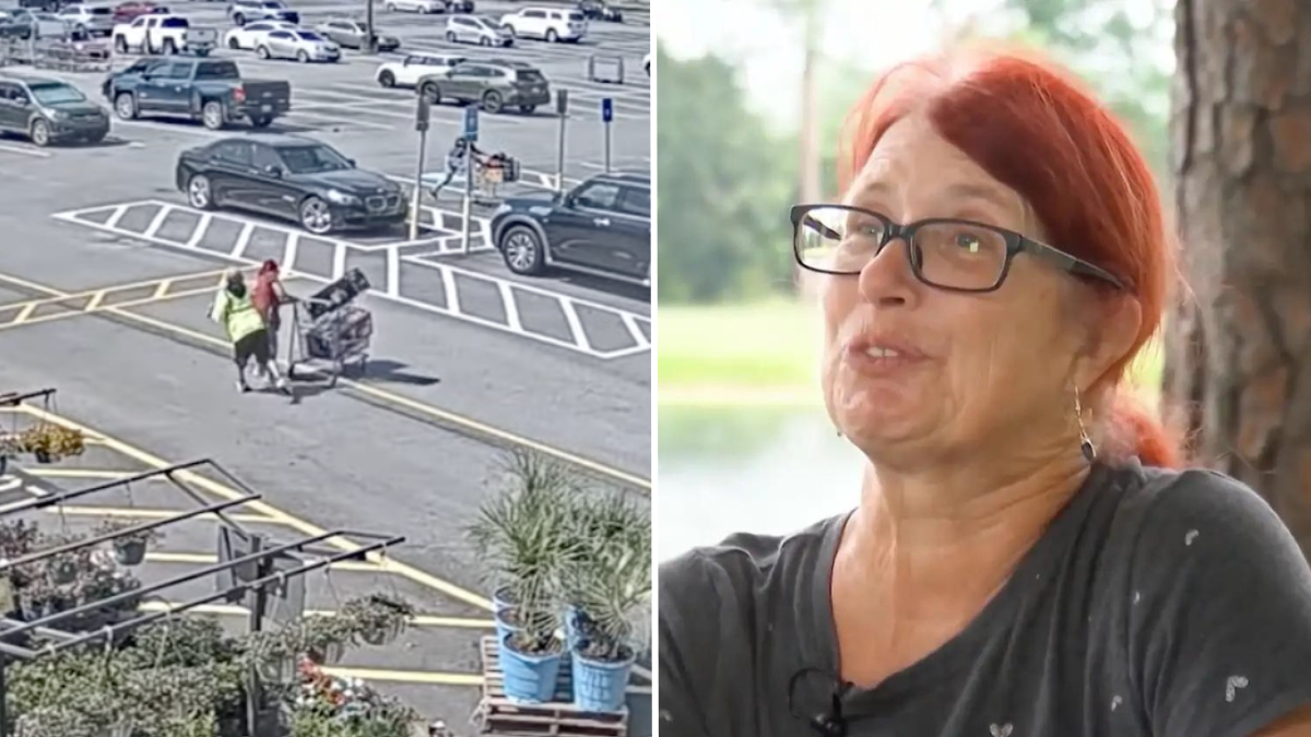 two people fighting in parking lot and a woman with red hair and glasses.