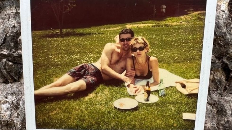 Patrick Dempsey and Jillian Fink young and having a picnic. 