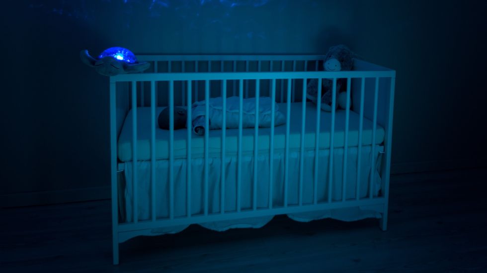 crib in a dark room