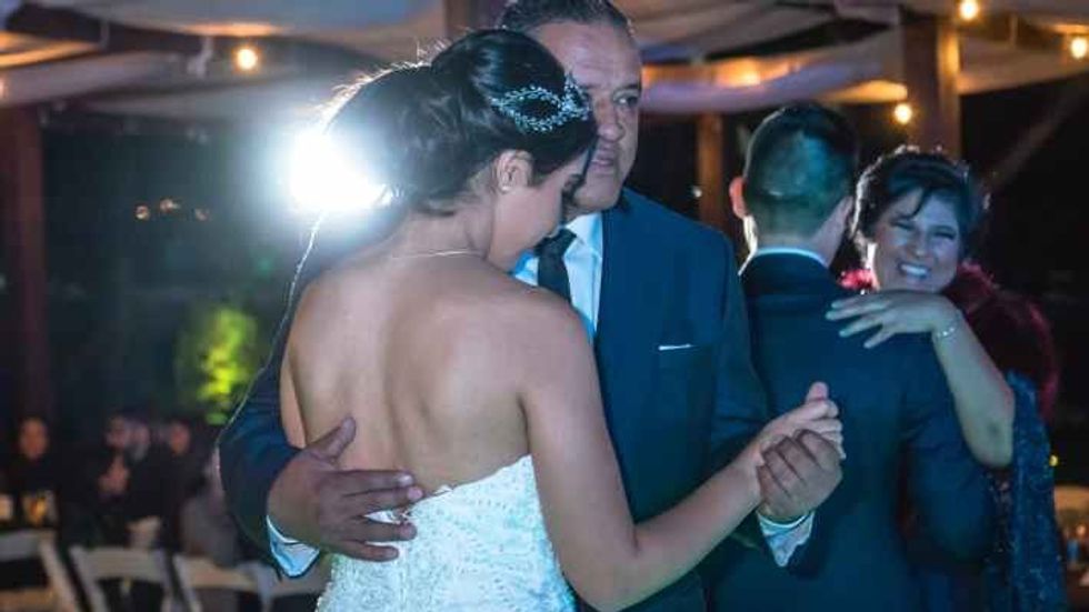 bride dancing with her father