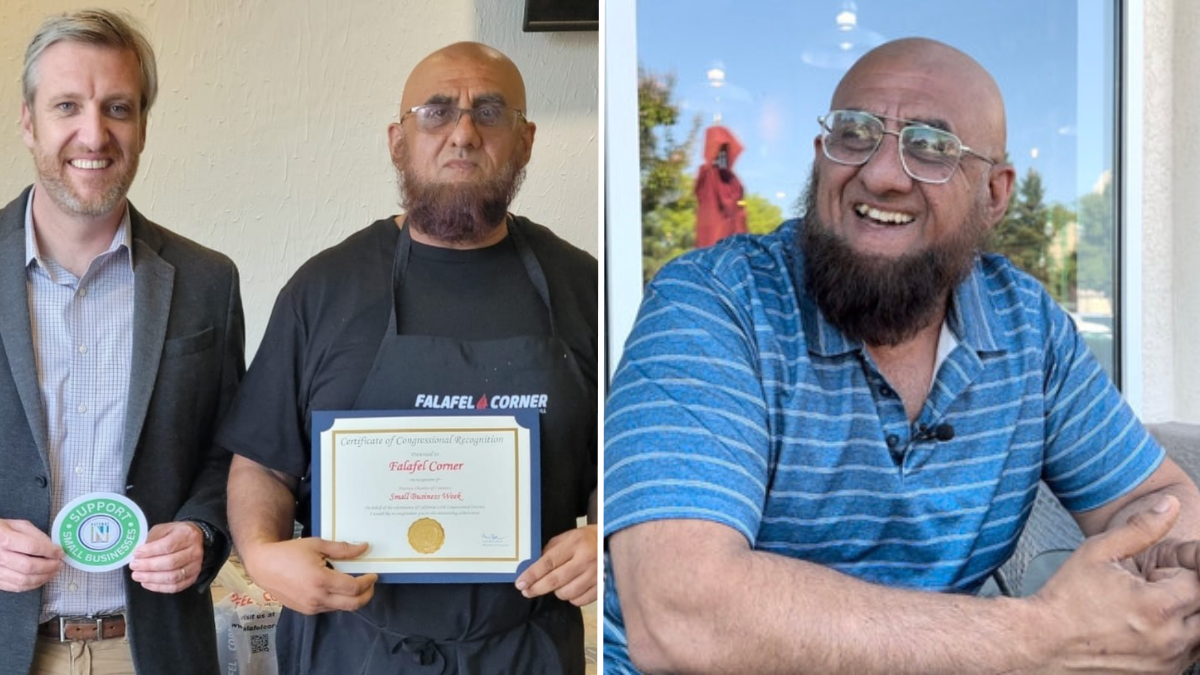 man holding a certificate and a man with a beard wearing a blue shirt