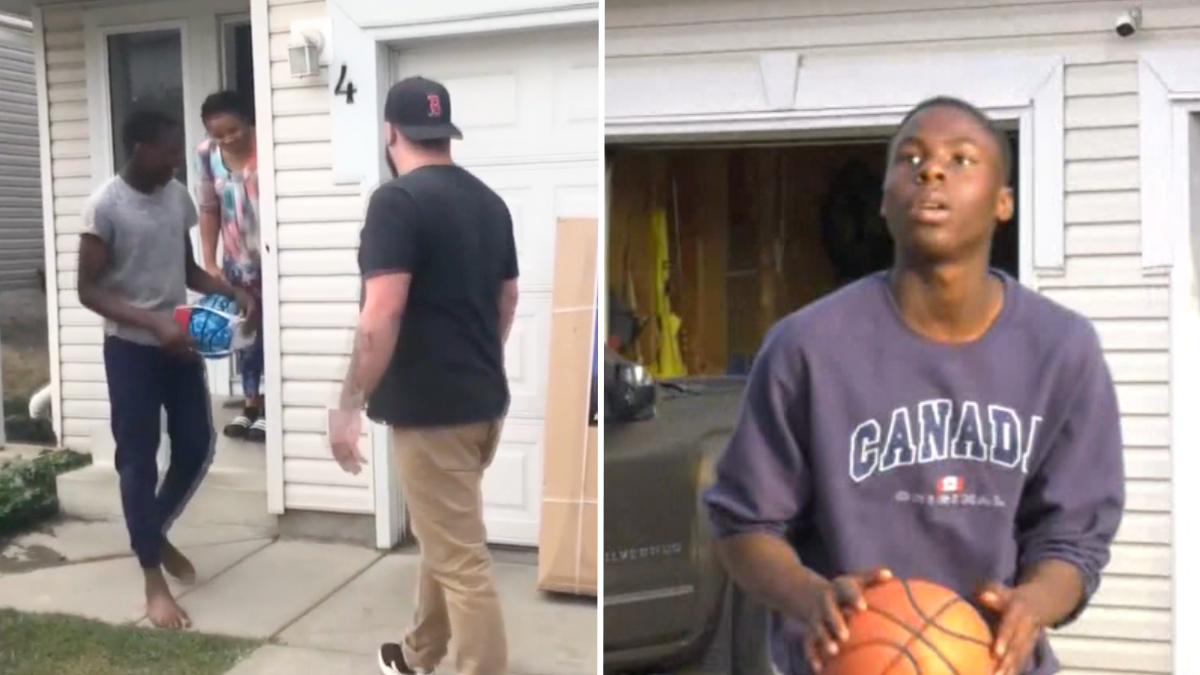 man talking to a teen boy and a teen playing basketball